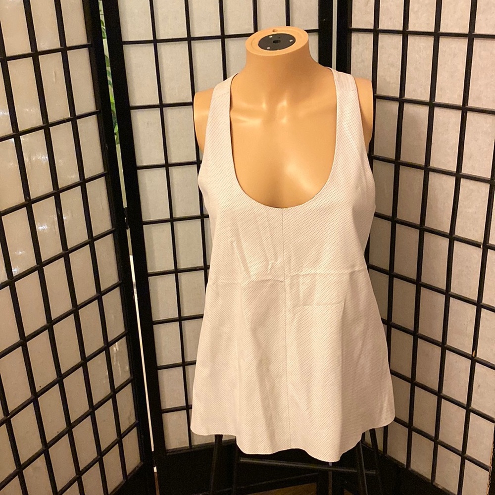 New condition, racer back, flare out, Genuine Leather, M/L size, tank top.